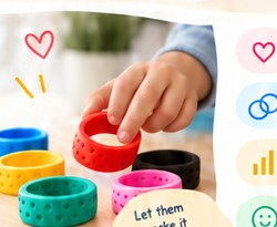 Child choosing colorful emotion rings